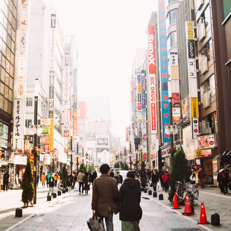 Couple walking at Street in Tokyo, Japan