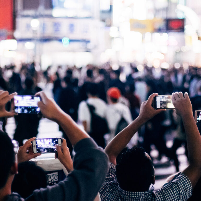 Shibuya Crossing in Tokyo, People taking pictures with smartphones - Street Photography in Japan