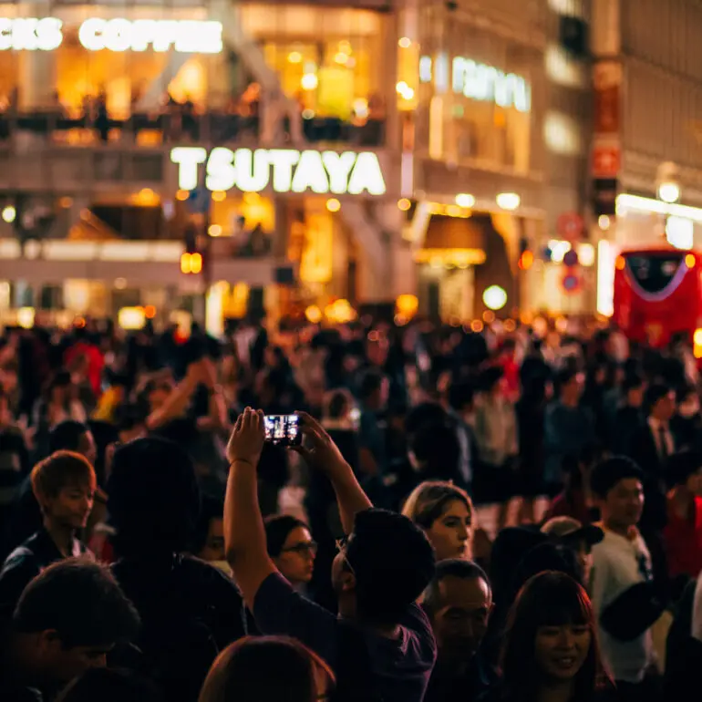 Shibuya Crossing in Tokyo, People taking pictures with smartphones - Street Photography in Japan