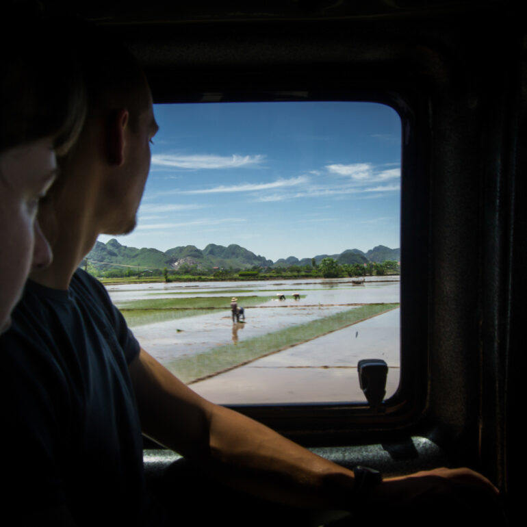 Visit Vietnam - Travellers looking Rice fields from window